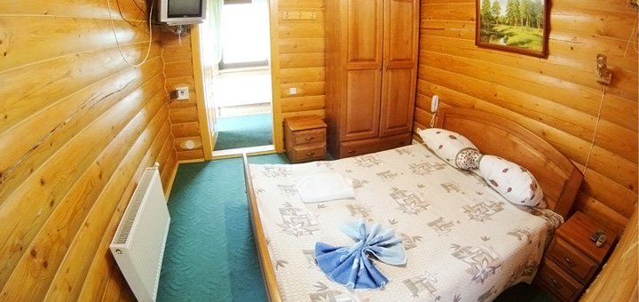 Готель «У Василини та Романа» у полянці. Забронювати номер зі знижкою. Недорогий відпочинок у Буковелі. Знижки на відпочинок у Карпатах.