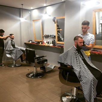 Men's haircuts at the KingsMan barbershop in Zaporozhye. Sign up for a discount.