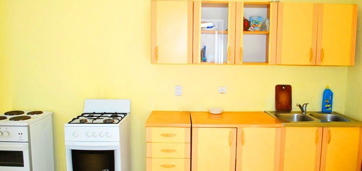 Kitchen block in the boarding house "Vlada" in the Iron Port. Plan your vacation at a discount.