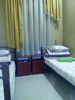 Двухместный номер с односпальными кроватями в гостинице «Central Park» во Львове. Бронируйте номер по акции.