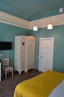 A room with a kitchenette at the Michelle apart-hotel in Odessa. Book a room for a promotion.