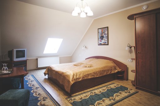 Junior suite room of the hotel and restaurant complex «V & P» in Khust. Pay for tickets at a discount.